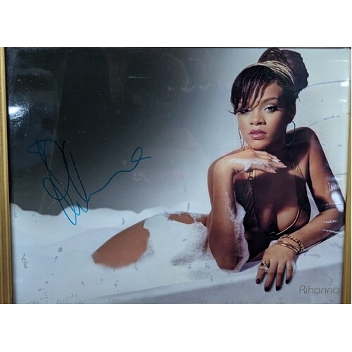 Rihanna Singer Signed Autographed Photograph Framed in poor condition