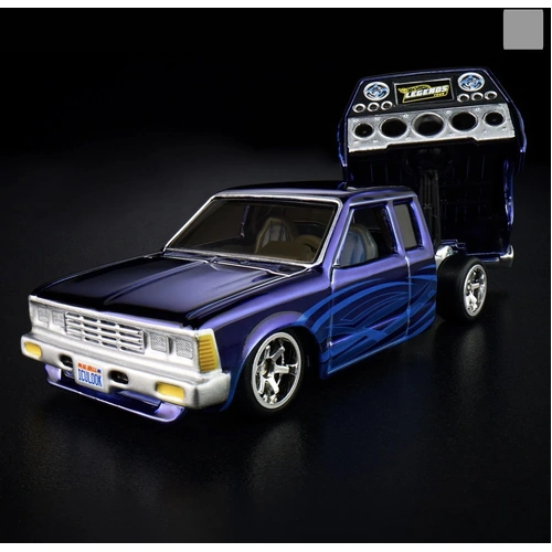 RLC 1986 Nissan 720 King Cab Blue 1/64 Hot Wheels JJY64