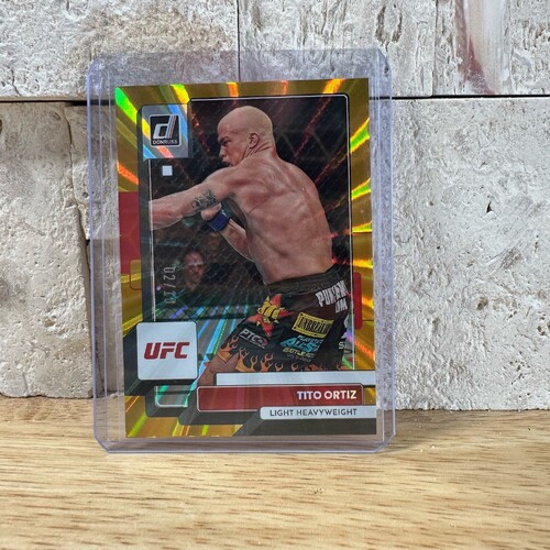 2023 Panini Donruss UFC TITO ORTIZ GOLD LASER 02/10 CARD #33